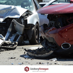 Close up of a smashed bumper following a car accident